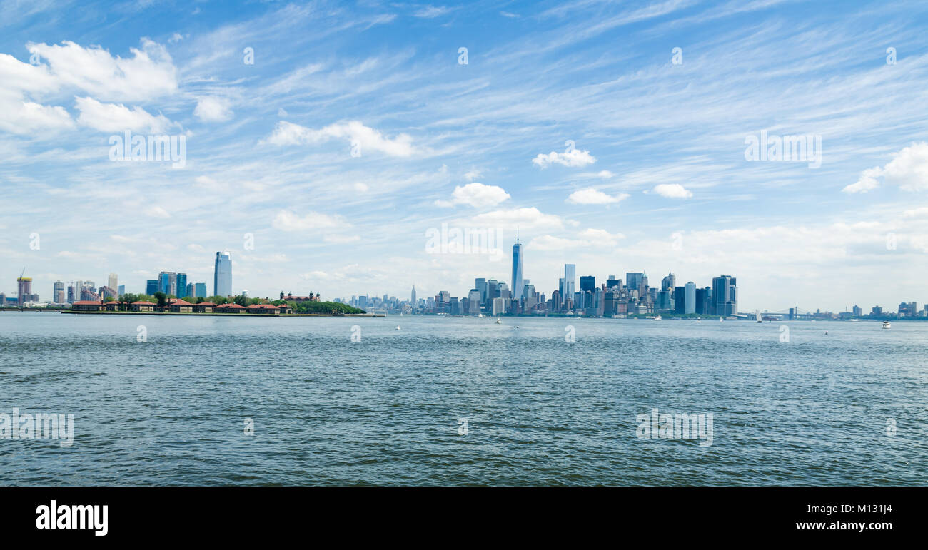 New York, USA - June 8, 2014: Lower Manhattan and Ellis Island, Upper New York Bay. Stock Photo