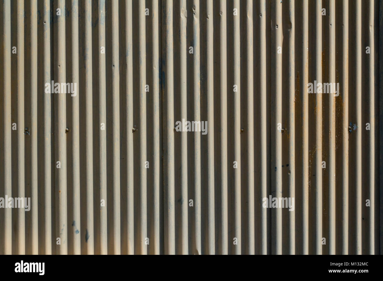 Dilapidated corrugated iron shed wall texture pattern Stock Photo