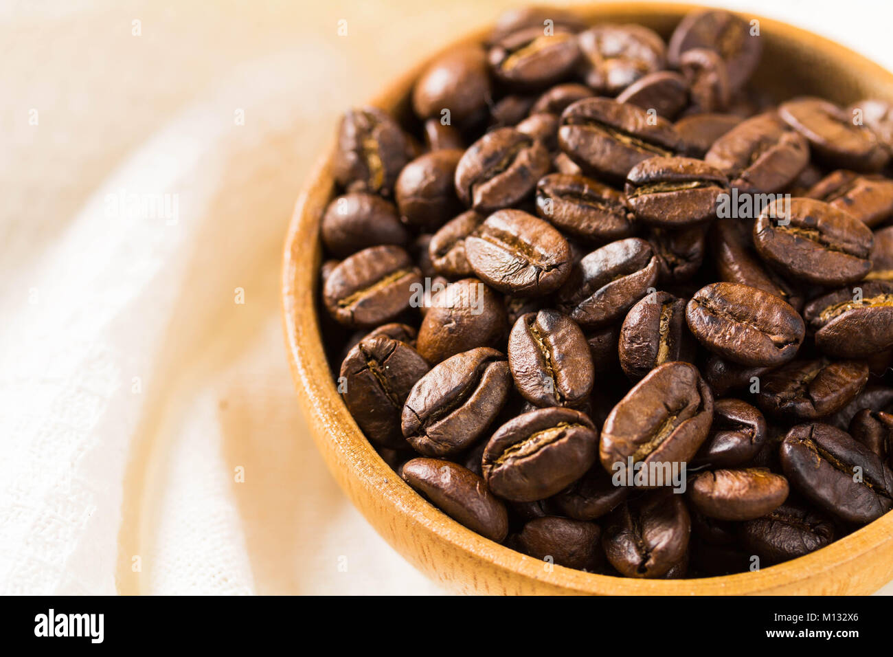 roasted brown coffee beans background Stock Photo - Alamy