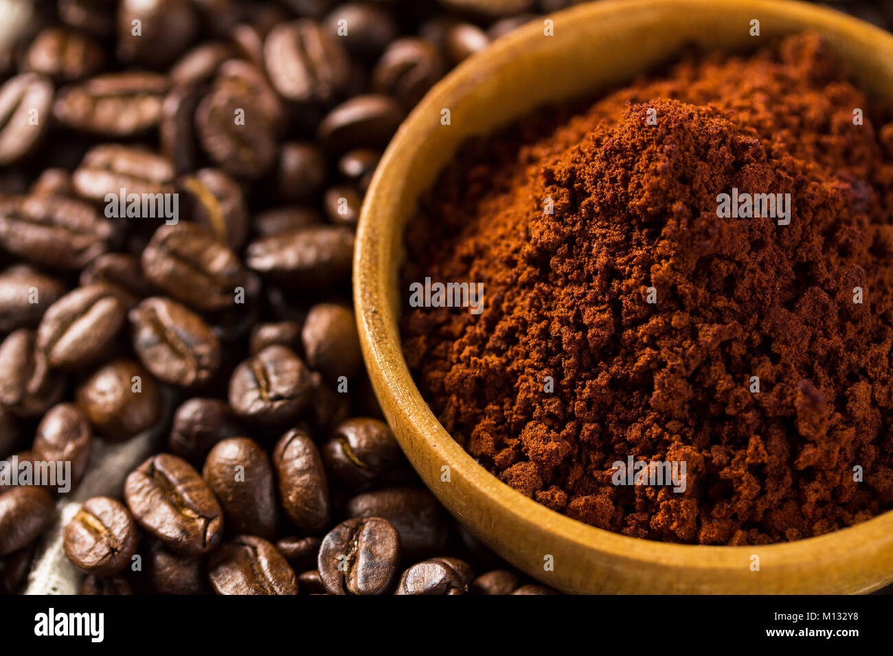 roasted brown coffee beans and powder background Stock Photo - Alamy