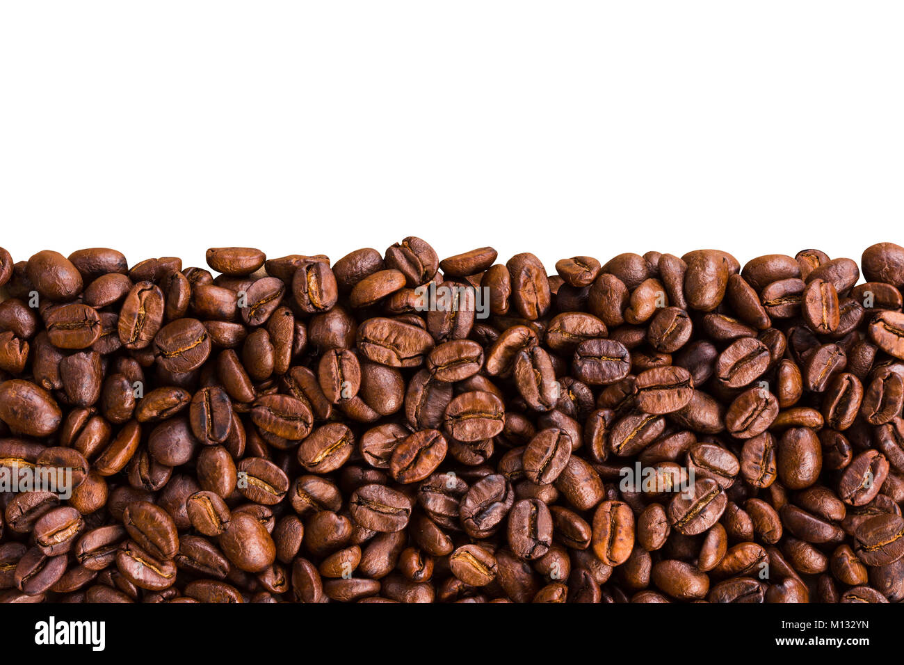 roasted brown coffee beans isolated background Stock Photo - Alamy