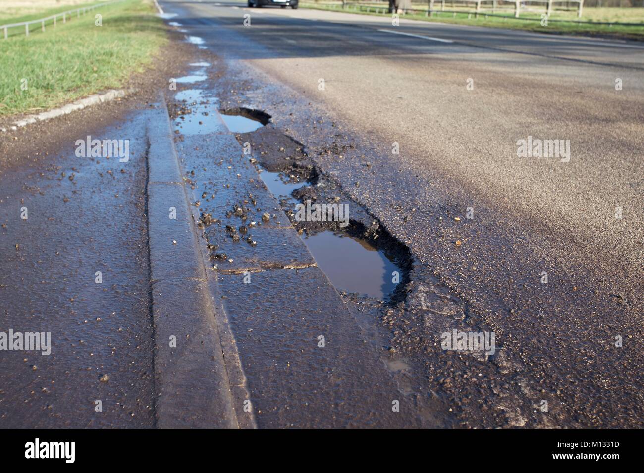 Multiple potholes in road hires stock photography and images Alamy