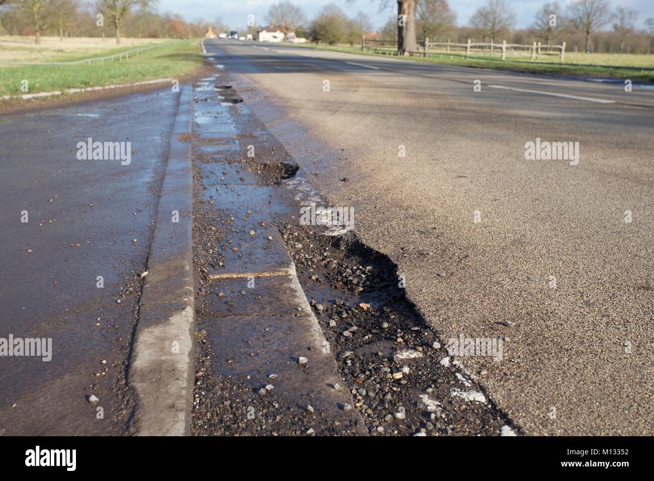 Multiple potholes in road hires stock photography and images Alamy