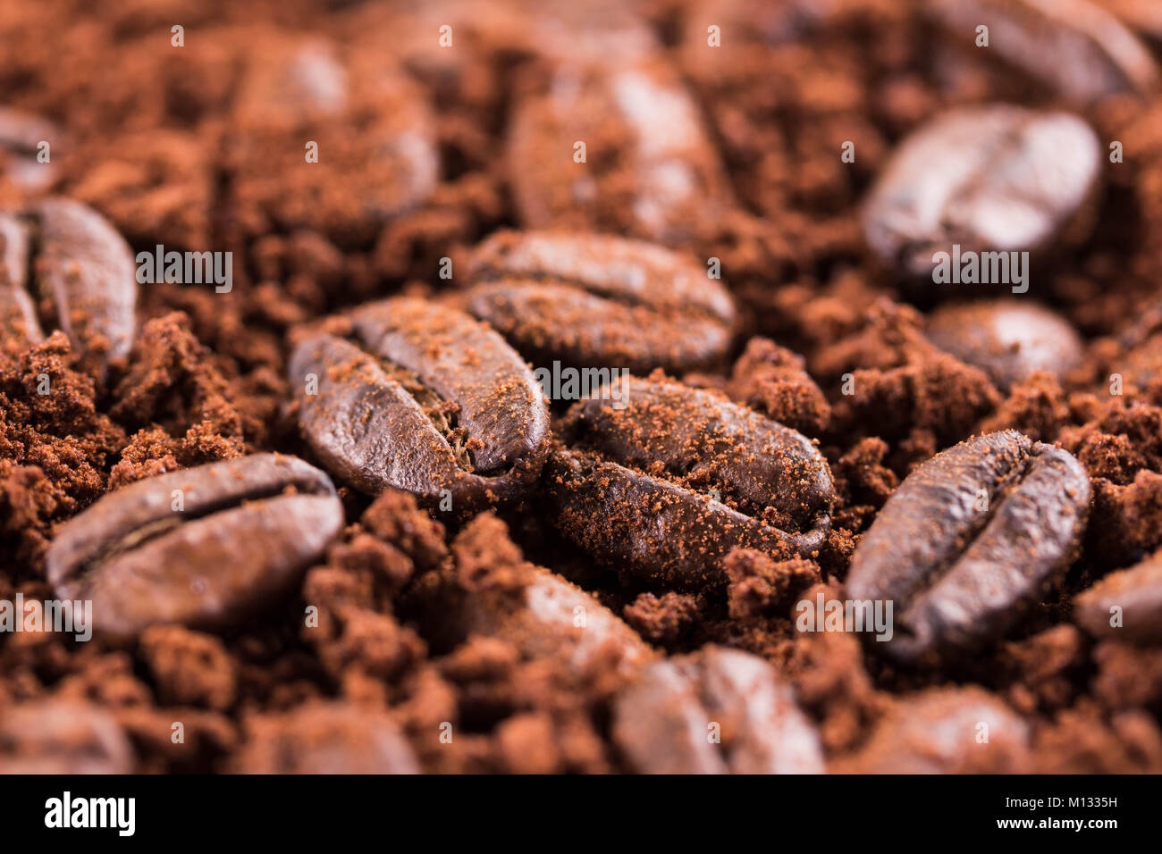 roasted brown coffee beans and powder background Stock Photo - Alamy
