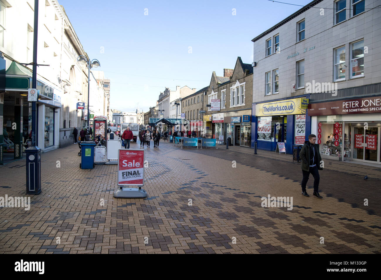 Shoppers in New Street, Huddersfield Town Centre, Kirklees Stock Photo