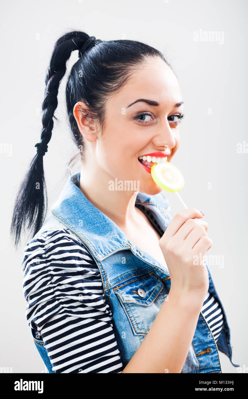 Happy girl with lollipop Stock Photo
