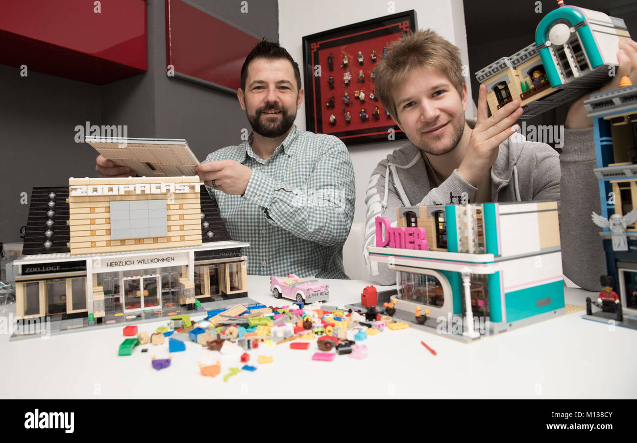 Lego enthusiasts Stephan Birner (L) and Felix Fleischer display their models in Berlin, Germany, 24 Janaury 2018. Photo: Jörg Carstensen/dpa Credit: dpa picture alliance/Alamy Live News Stock Photo