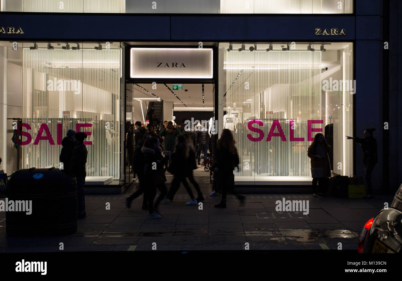 London, UK. 22nd Jan, 2018. People walk past a 'sale' advertisement from a  Zara store on Oxford Street in London. Credit: Rahman Hassani/SOPA/ZUMA  Wire/Alamy Live News Stock Photo - Alamy