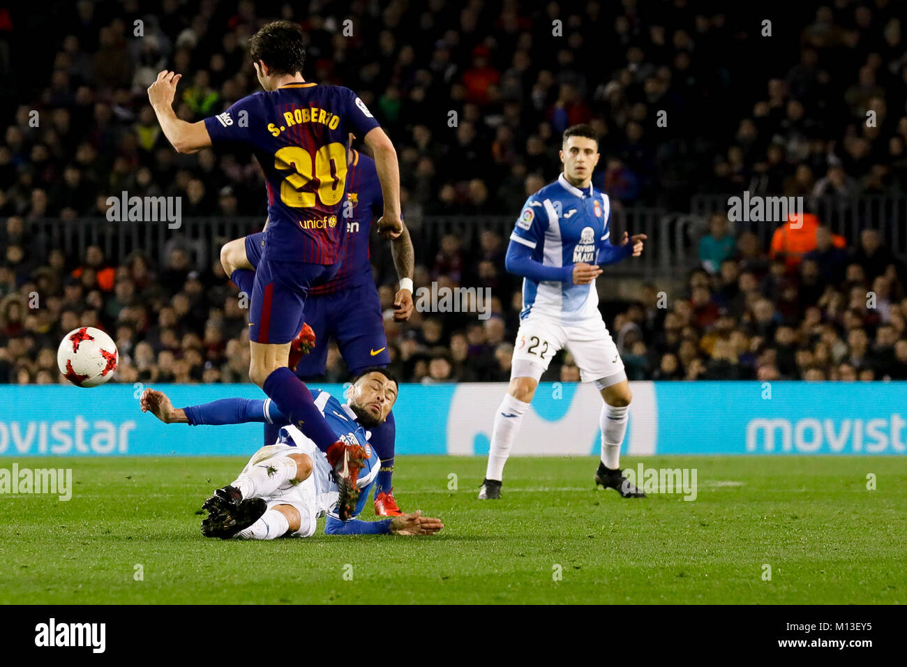 Camp Nou, Barcelona, Spain. 25th January, 2018. Javi Fuego triying to stole the ball to Sergi Roberto during the quarter finals of Copa de S.M. del Rey 17/18 on the match between Fc Barcelona and Rcd Espanyol at Camp Nou, Barcelona, Spain. Credit: G. Loinaz/Alamy Live News Stock Photo