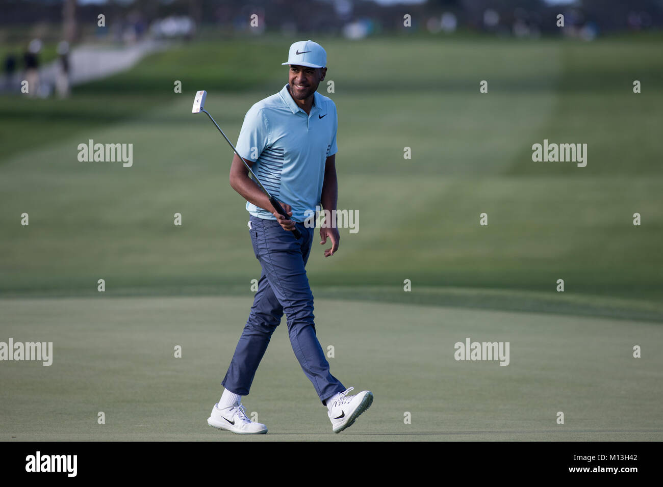January 25, 2018 San Diego, USA...Tony Finau all smiles after birdie on 18 to take (-7 under) for clubhouse during opening round on North Course of the Farmers Open at the Torrey Pines golf course in San Diego, Ca on January 25, 2018. Jevone Moore Stock Photo