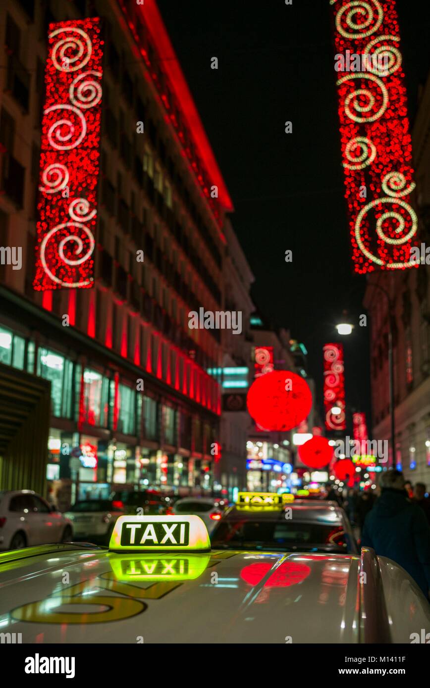 Austria, Vienna, Rotenturmstrasse, Christmas decorations and taxi Stock Photo