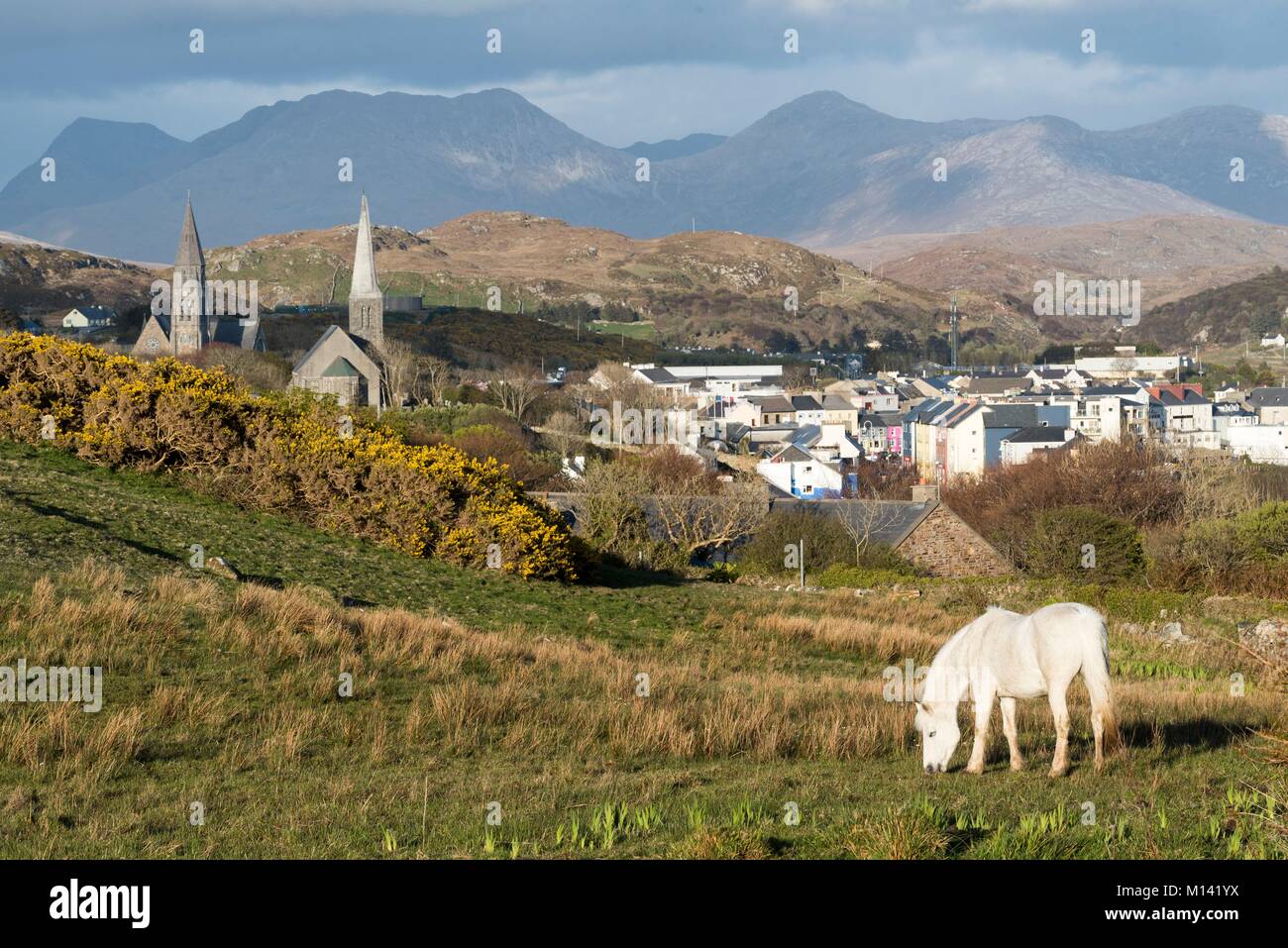 Ireland, County Galway, Clifden, Connemara, Clifden Town and the Twelve Bens in the background Stock Photo