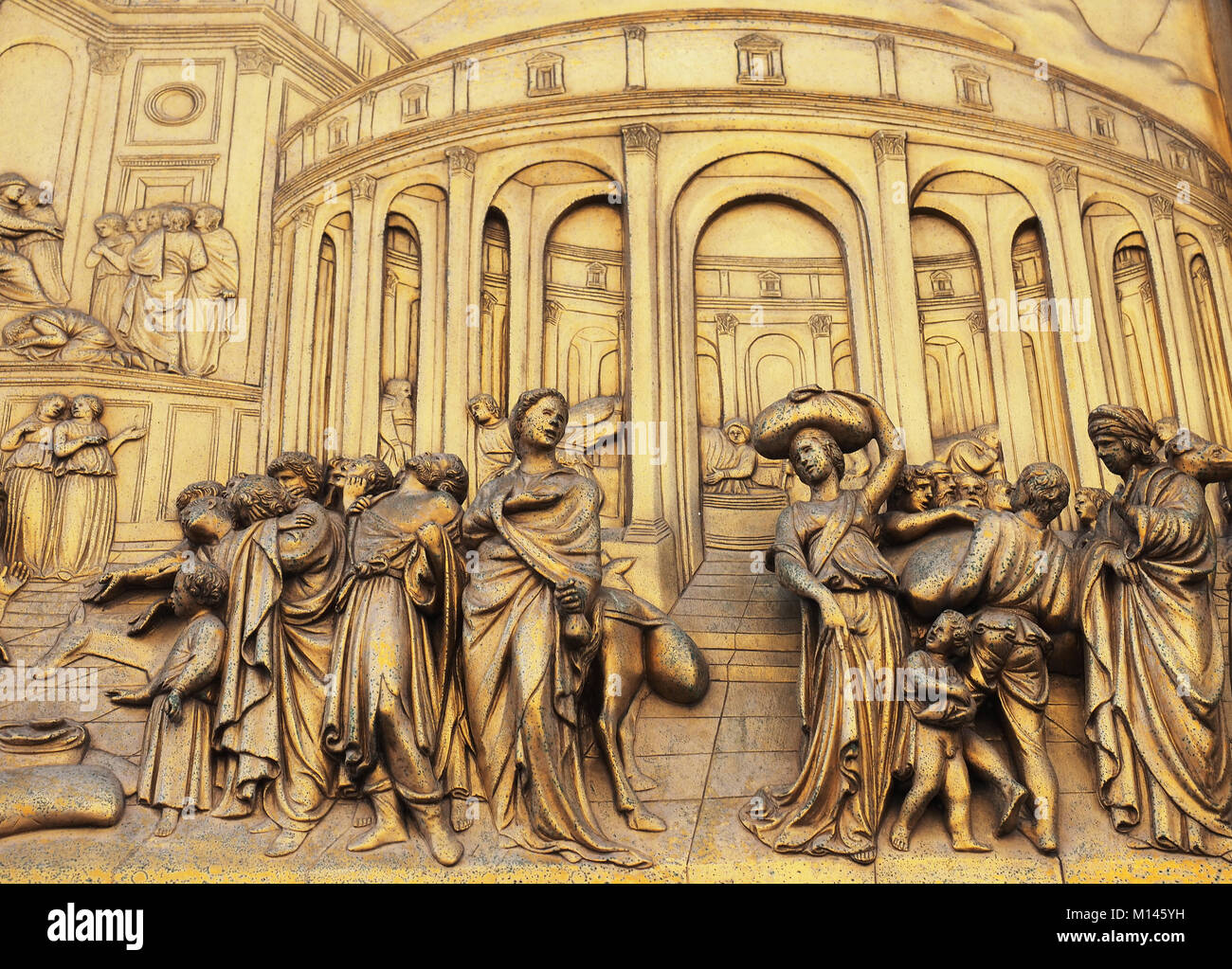 Italy,Tuscany,Florence,Dome square,Baptistry of St.John,Scene on the Gates of Paradise,The story of Joseph,Lorenzo Ghiberti artist,East Bronze Doors. Stock Photo