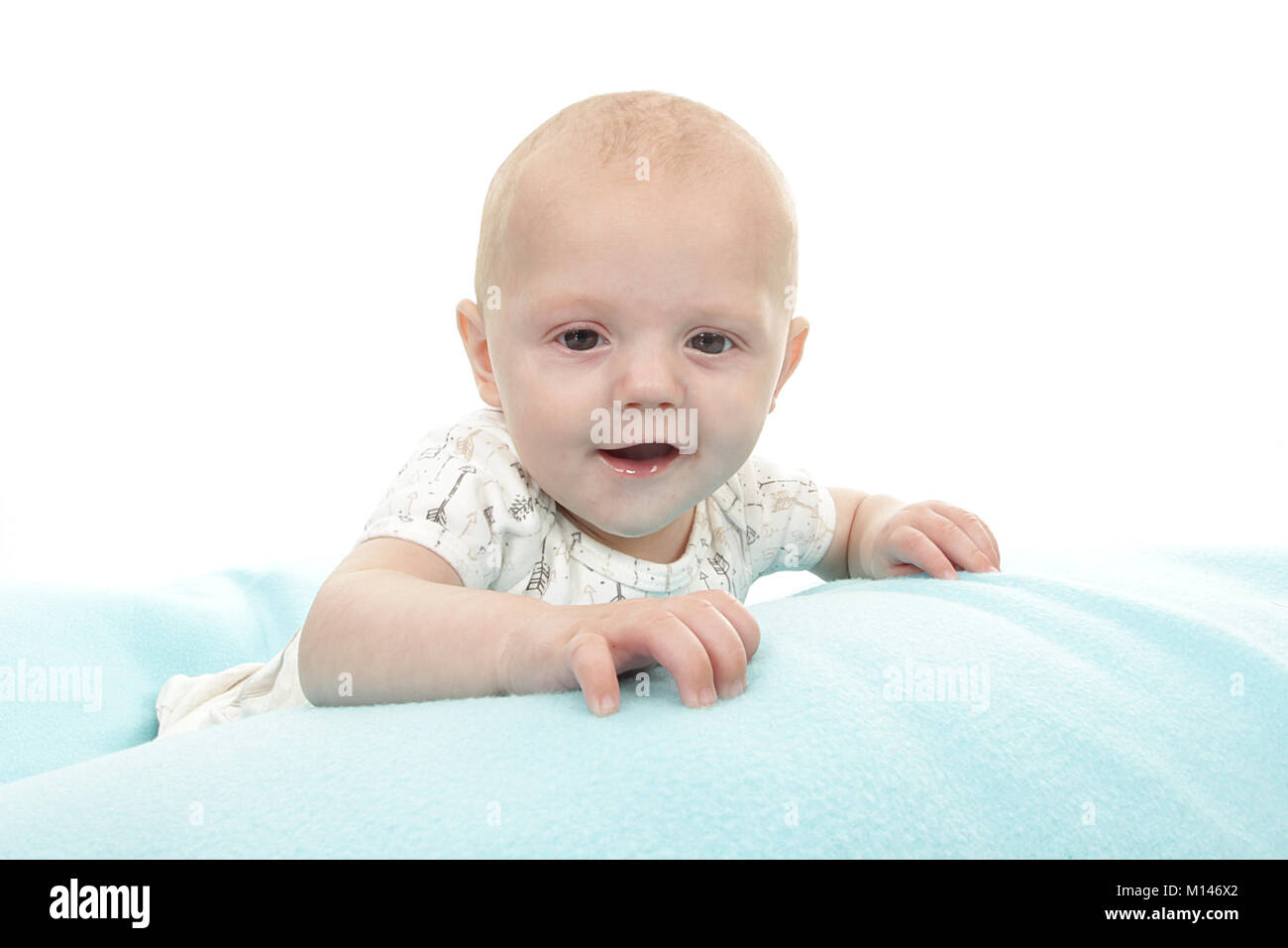 5 month old baby boy in nursery , Happy and relaxed, relaxing Stock