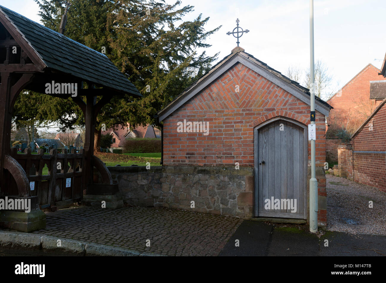 The bier building by All Saints Church, Thurlaston, Leicestershire, England, UK Stock Photo