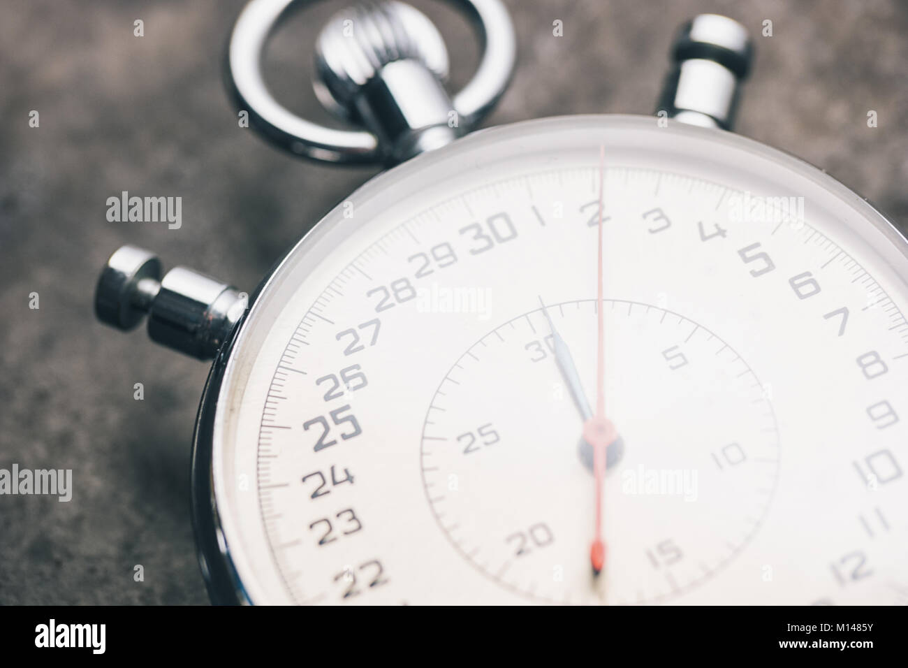 close view of a stopwatch against a metal background, including copy space. Stock Photo