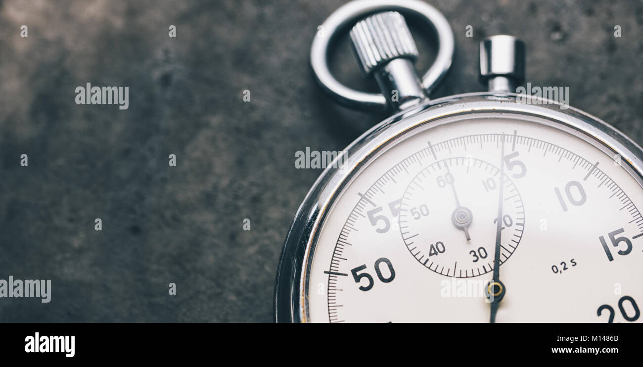 view of a stopwatch on a metal background, including copy space. Stock Photo