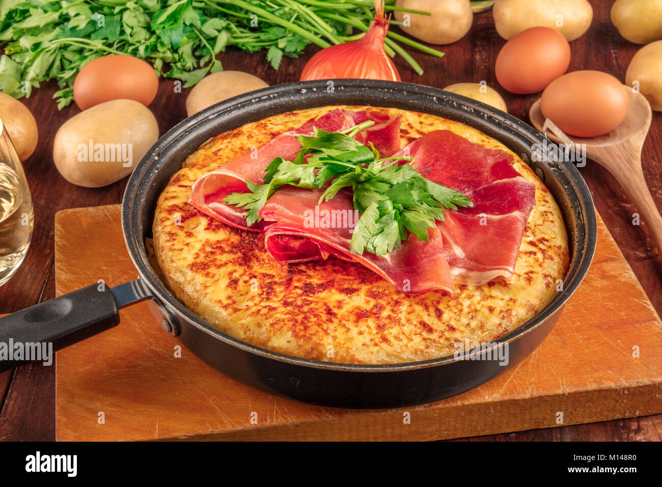 A closeup photo of a Spanish tortilla with ingredients Stock Photo Alamy