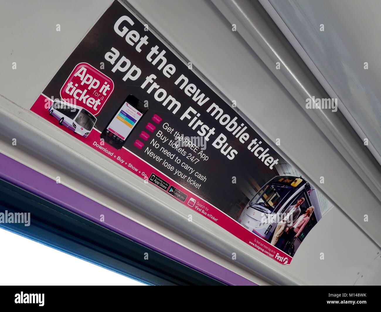 Advert on an Ipswich bus for ticketless travel. User buys a virtual ticket via an app and shows their phone to the bus driver on entry. Stock Photo
