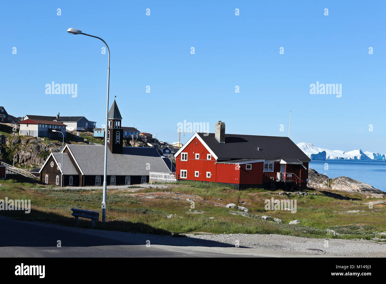 colourful houses in the town Ilulissat formerly Jakobshavn or Jacobshaven, Western Greenland Stock Photo