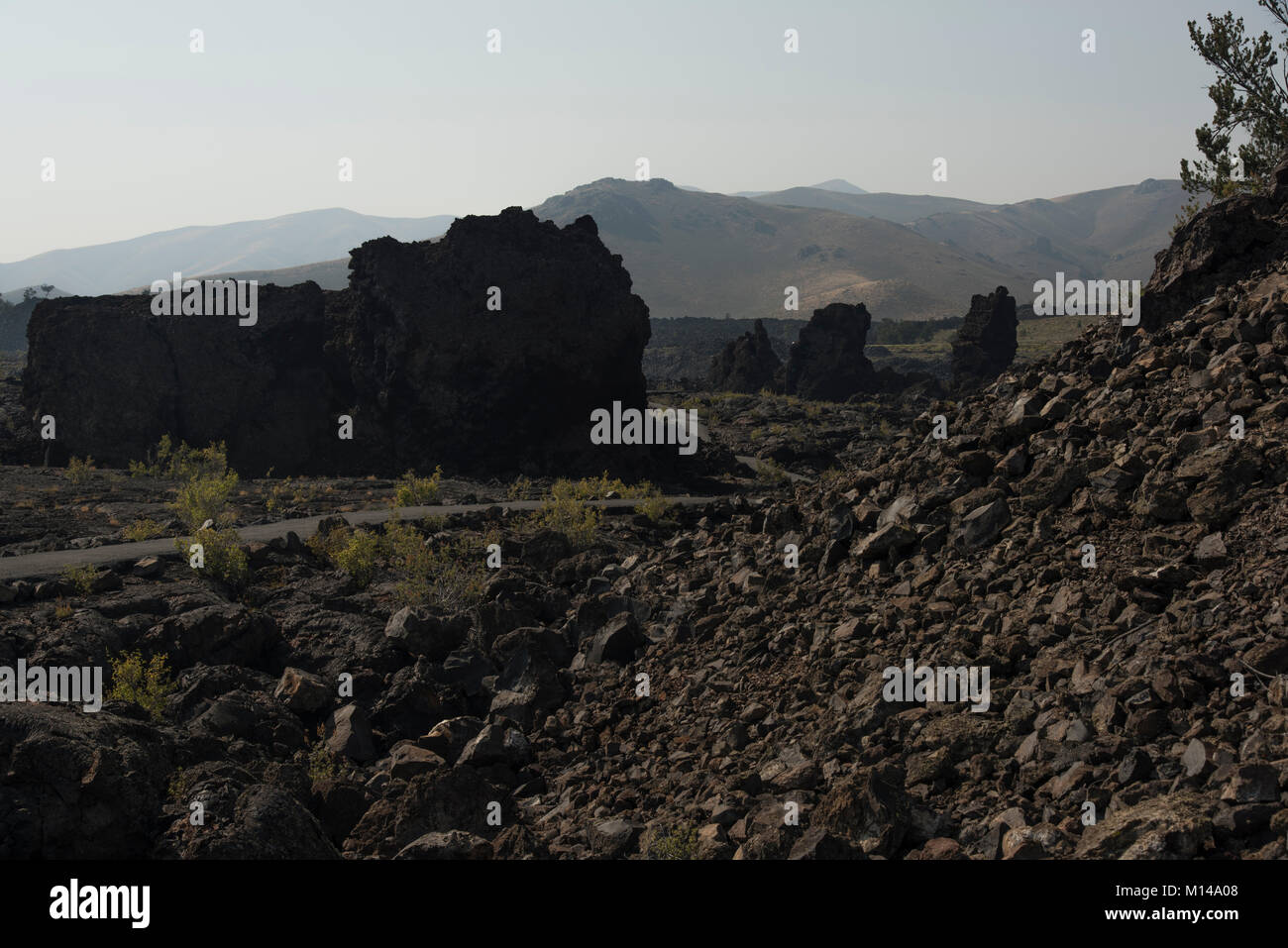 Monoliths and crater fragments along the North crater flow ield at Craters of the Moon Natl. Monument and Preserve, Idaho, USA Stock Photo