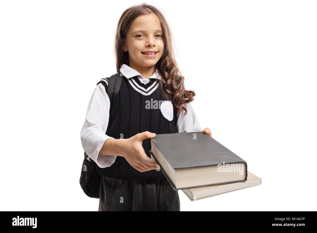 Little schoolgirl giving books isolated on white background Stock Photo ...