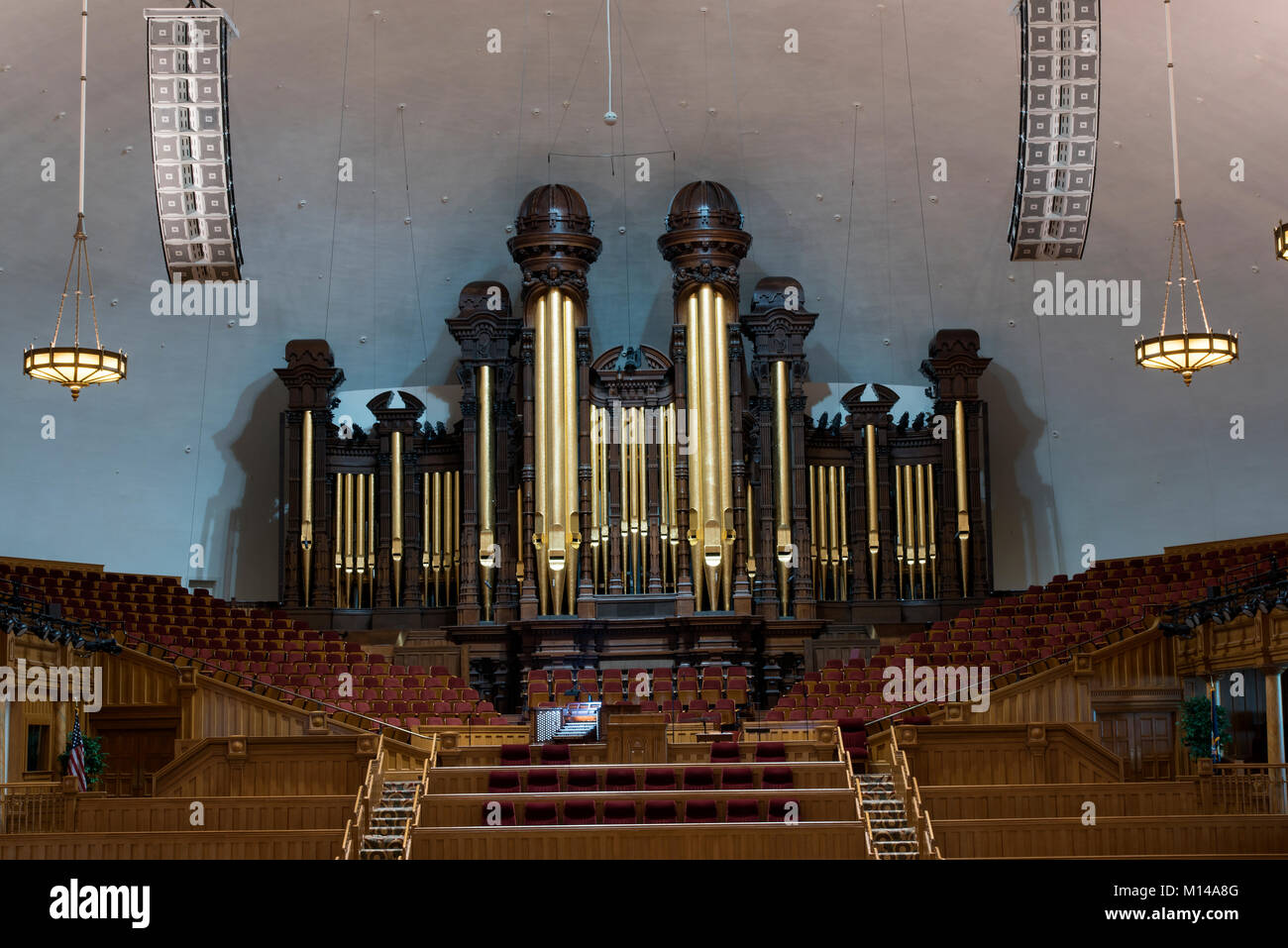 The pipe organ and alter in the Mormon Tabernacle, next to the Mormon Temple in Salt Lake City, Utah, USA. One of the largest organs in the world, it  Stock Photo