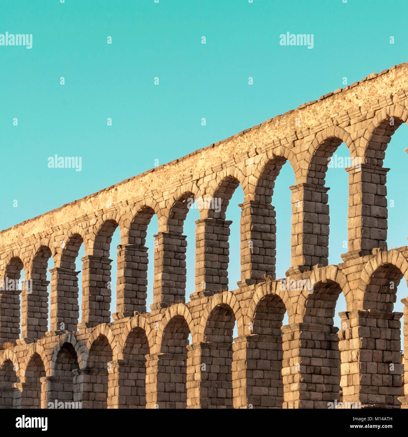 A square photo of an ancient Roman aqueduct in Segovia, Spain Stock ...