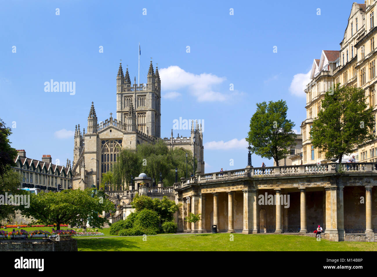 Bath, UK - 3rd July 2011: People relax in a park near historic Bath Abbey in the City of Bath, Somerset, UK. Bath is a UNESCO World Heritage Site famous for it's architecture. Stock Photo