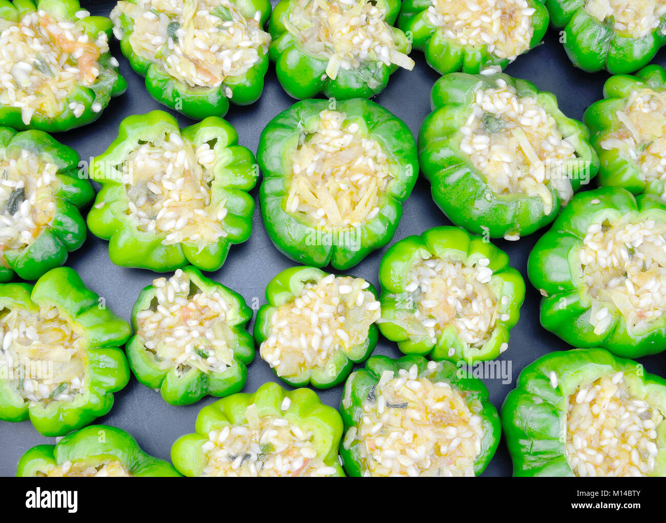 Uncooked stuffed peppers on baking dish Stock Photo Alamy