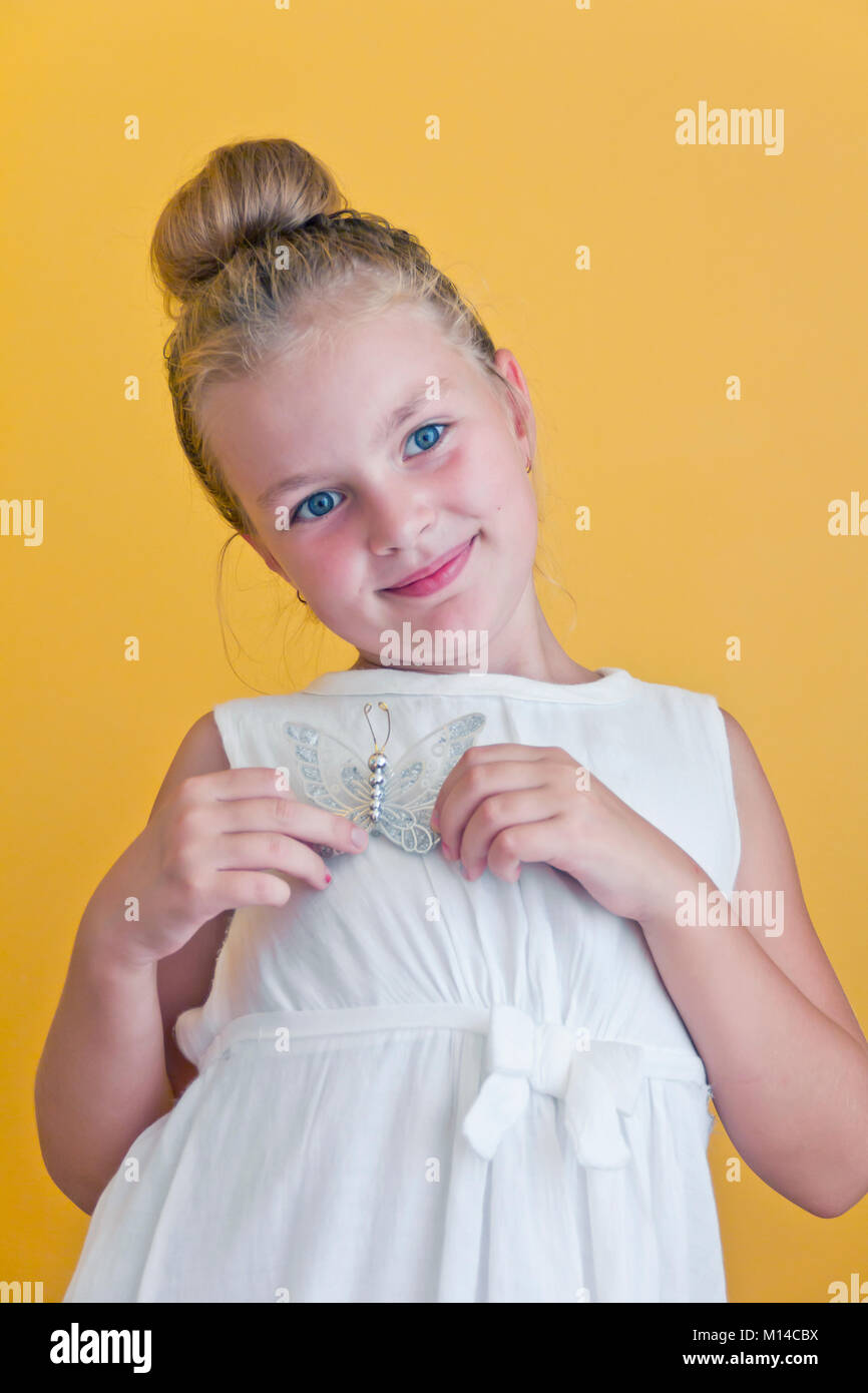 Cute girl with blond long hair and blue eyes Stock Photo - Alamy