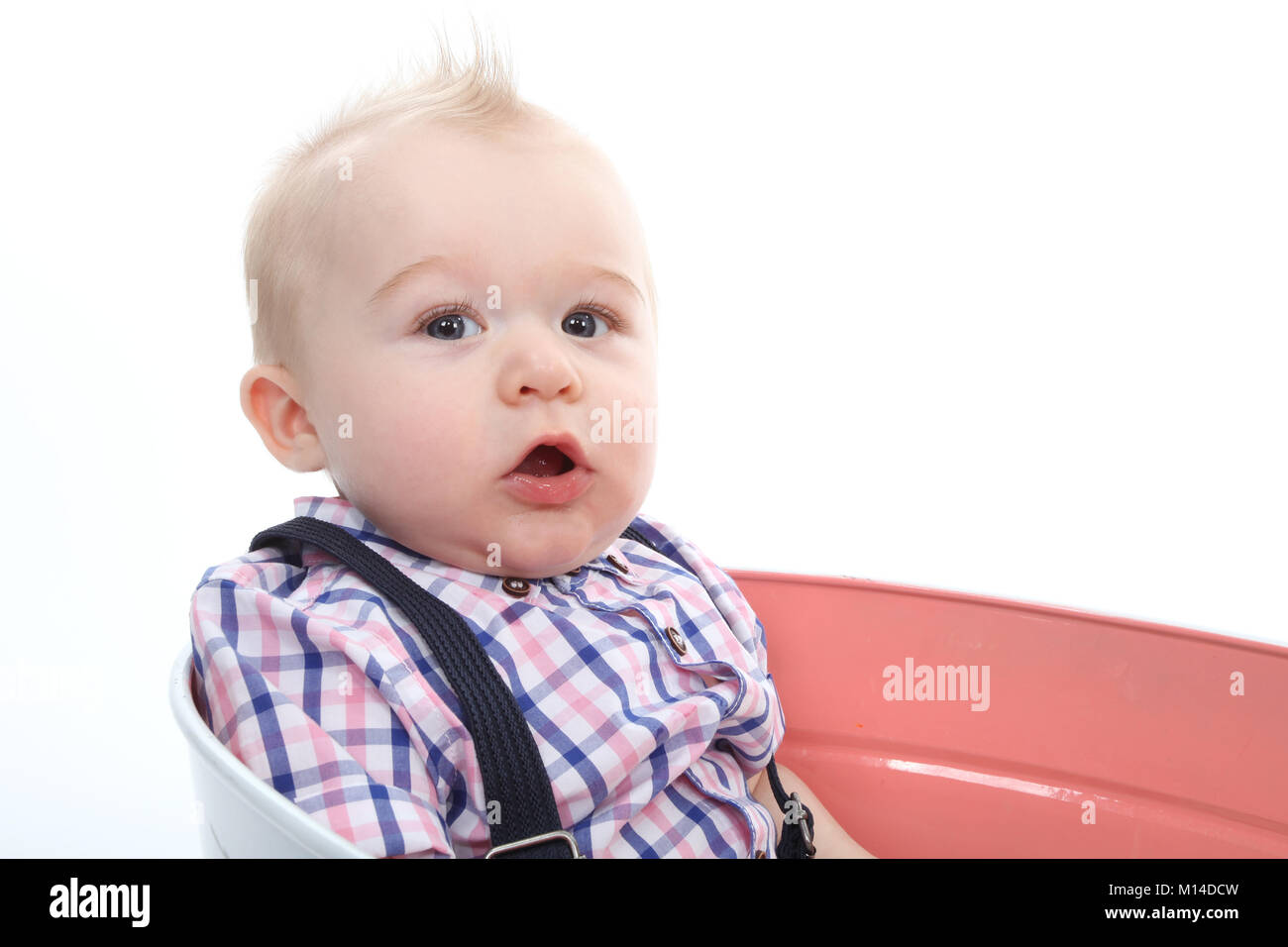6 months old child, playing in the garden, cognitive development, stimulation,Multi Sensory Environment Stock Photo
