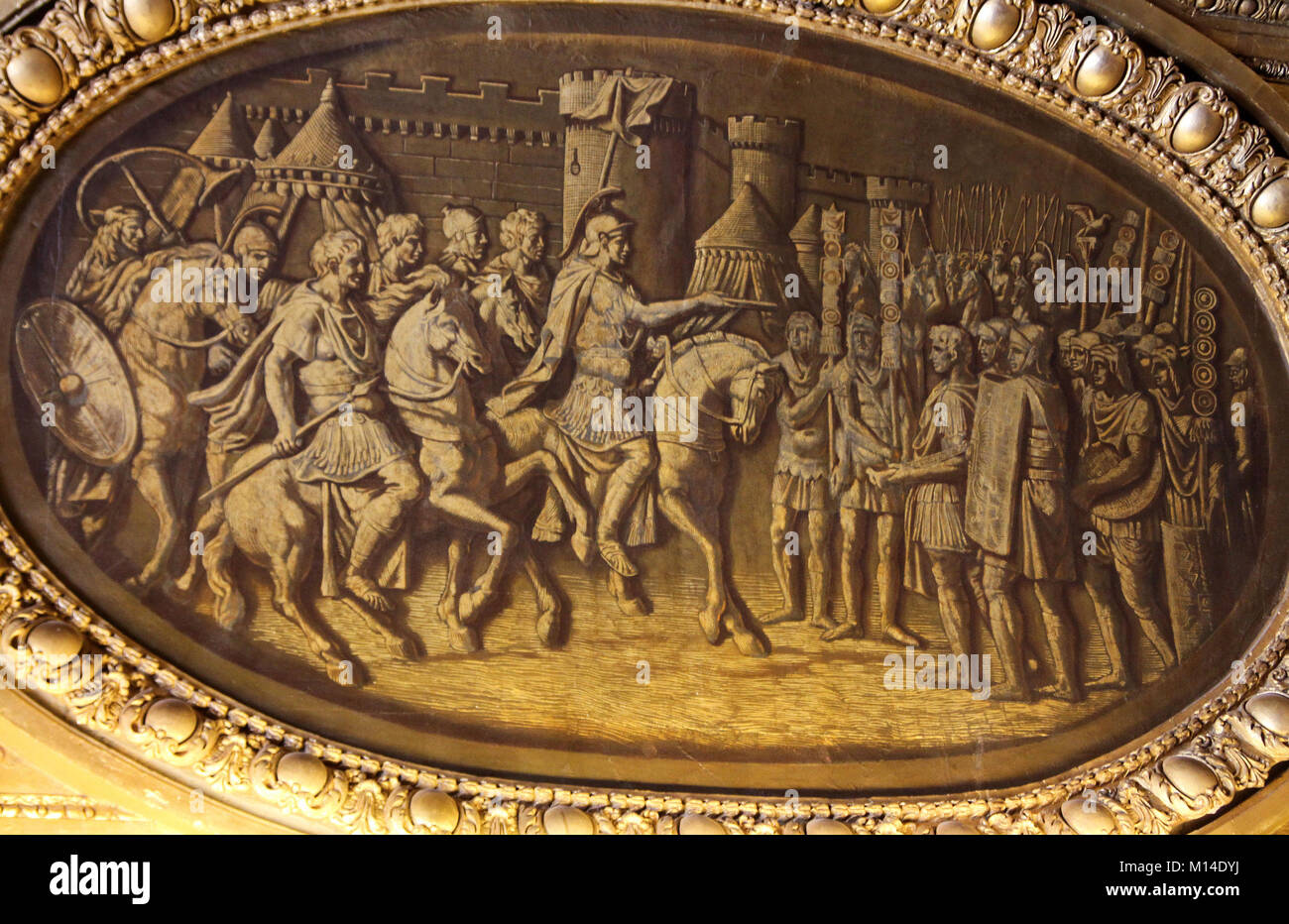 Golden-framed painting, Caesar Legions passing their review, portion of the ceiling in the Mars Salon, Verailles Palace, Ile-De-France, France. Stock Photo