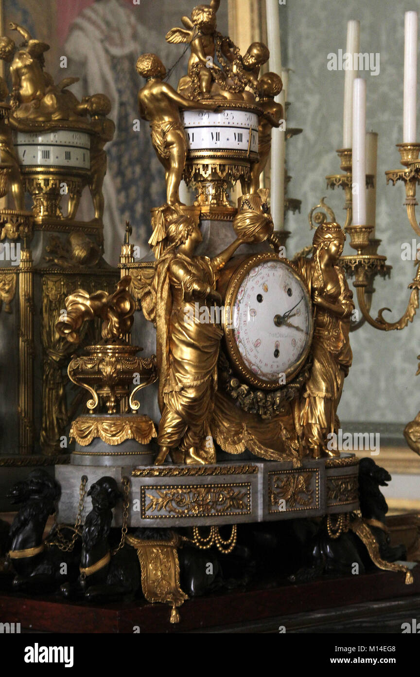 Mantlepiece garniture clock in the Nobles Salon, Versailles Palace, Ile-De-France, France. Stock Photo