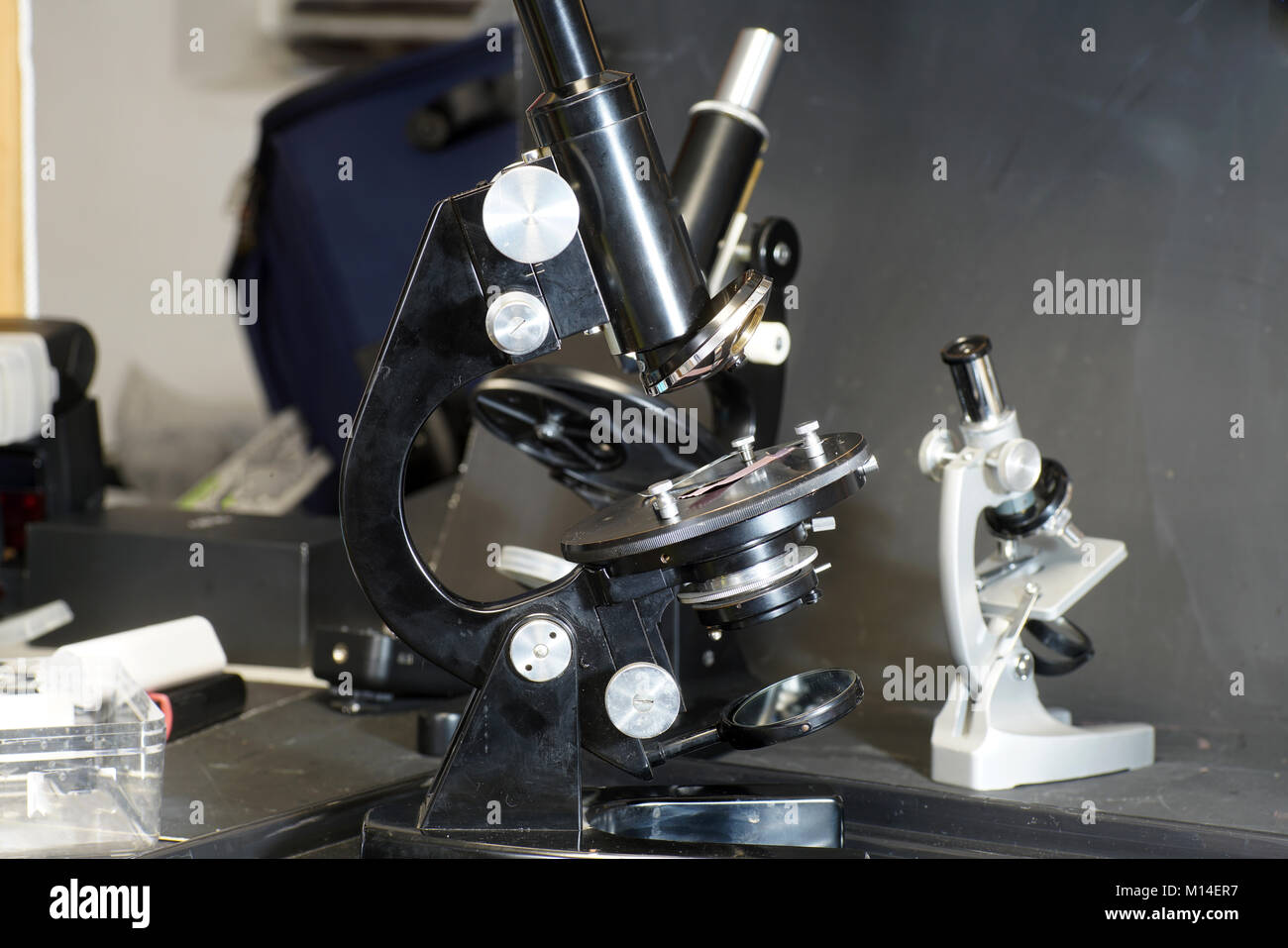 Microscope and test tubes photographed in the studio Stock Photo - Alamy