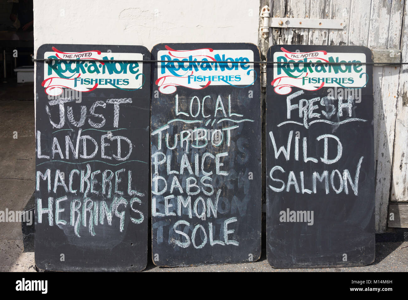 Rock-a -Nore Fisheries fish availabity boards, Hastings Old Town, Rock-a-Nore Road, Hastings, East Sussex, England, United Kingdom Stock Photo
