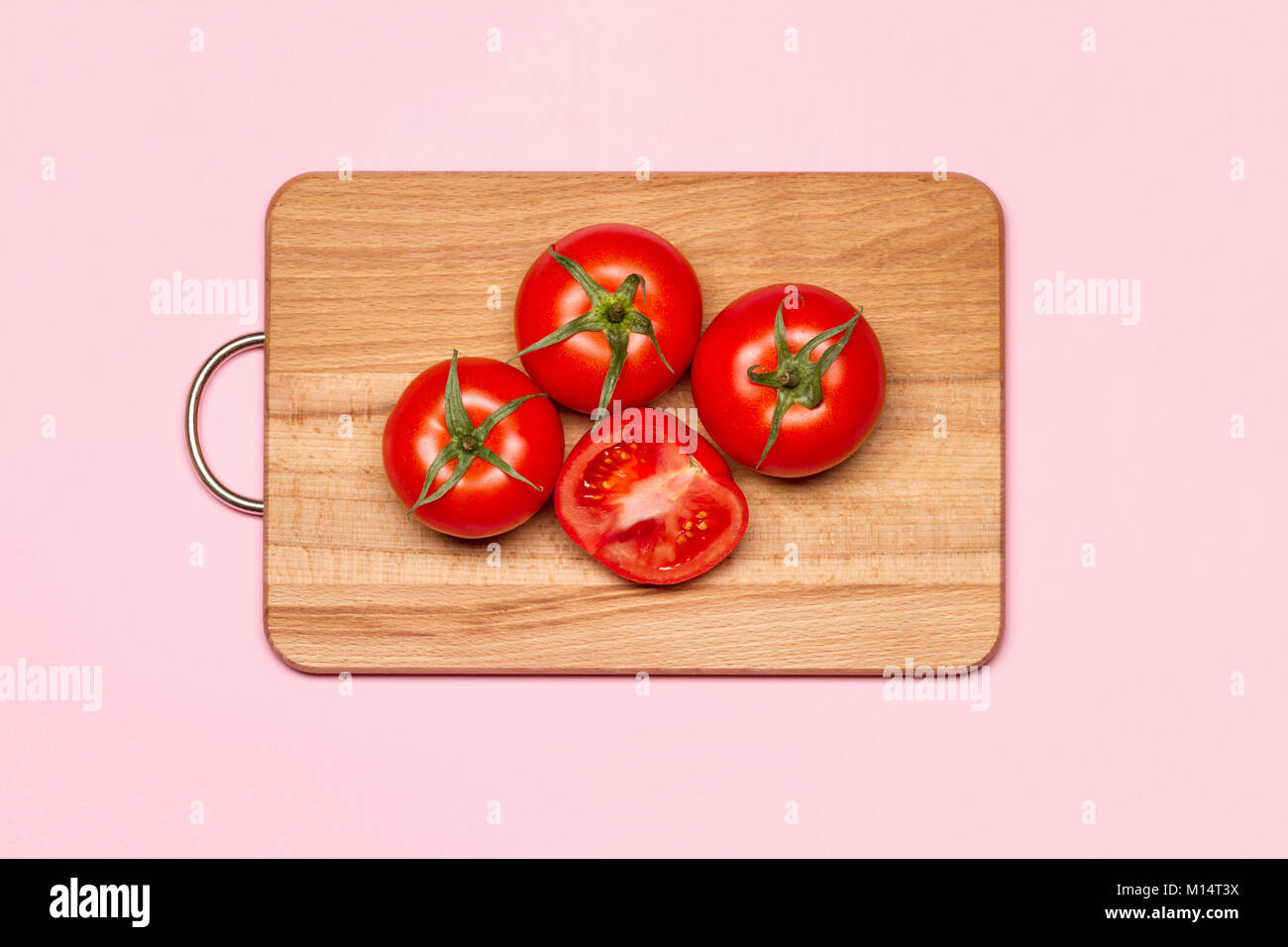 Three Fresh Tomato Near Slice Stock Photo Alamy