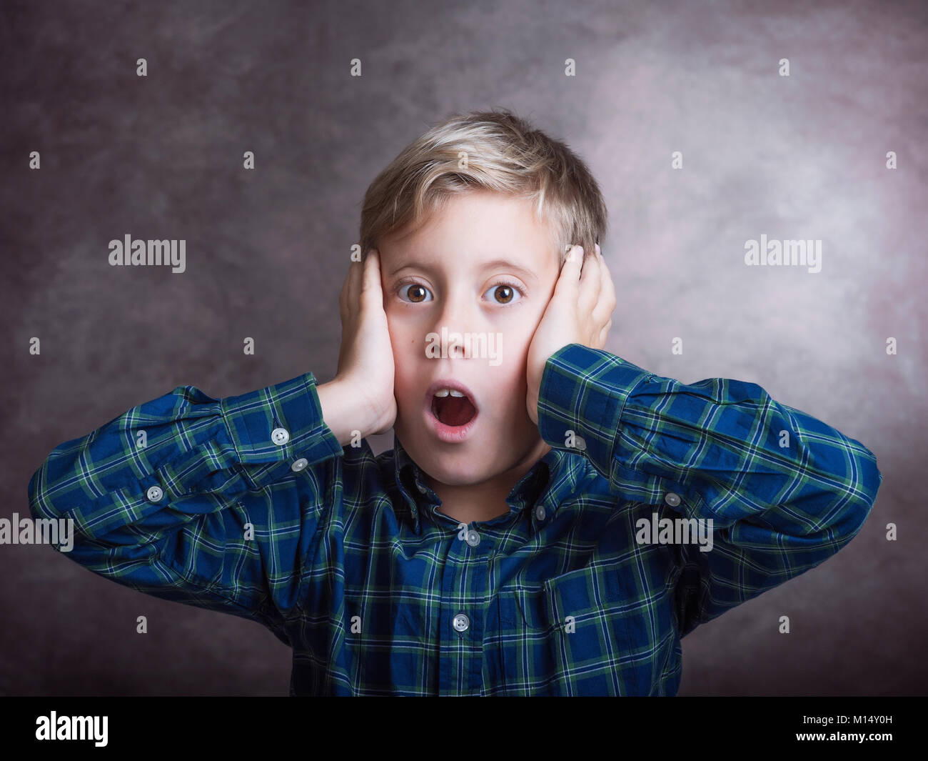Young boy surprised. Stock Photo