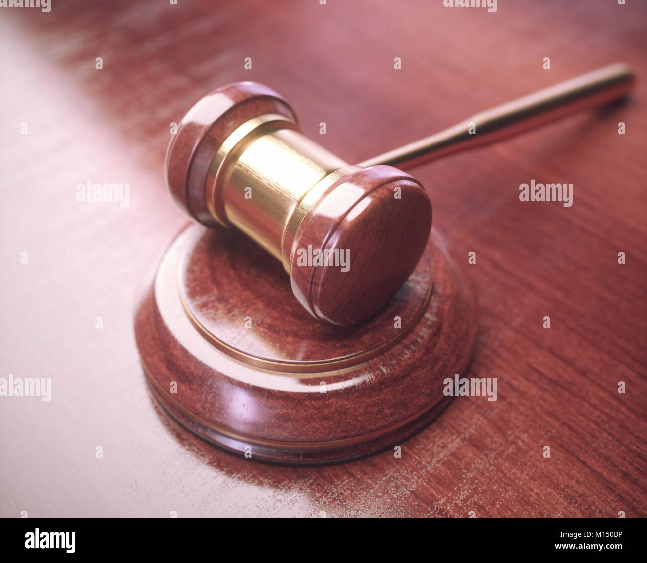 Gavel, judge hammer. Close up of wooden hammer with gold details. Concepts of law and auction. Stock Photo