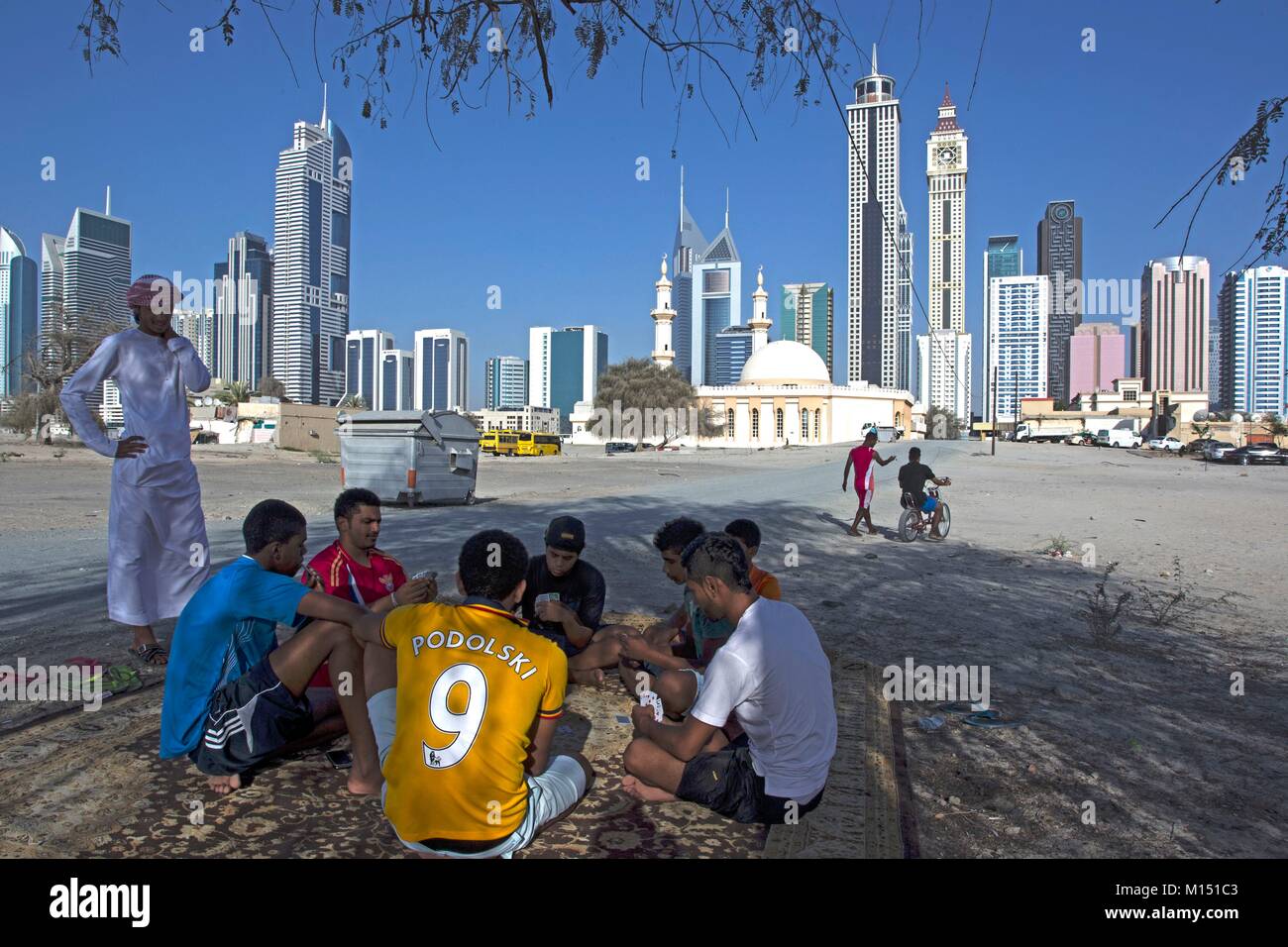 United Arab Emirates, Dubai, workers near Sheikh Zayed road Stock Photo