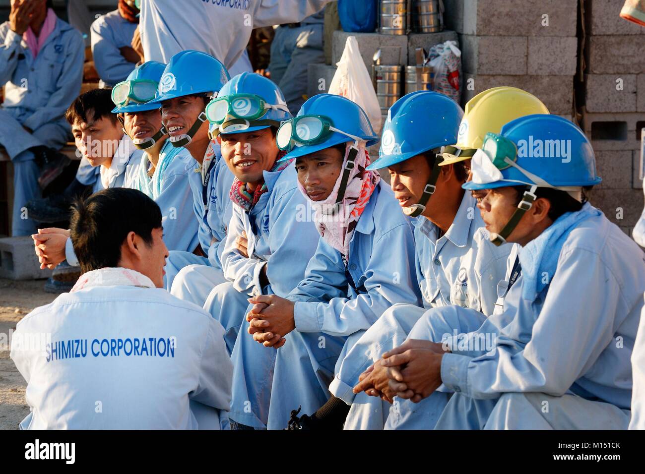 United Arab Emirates, Dubai, workers on construction site on Palm Jumeirah (2005) Stock Photo