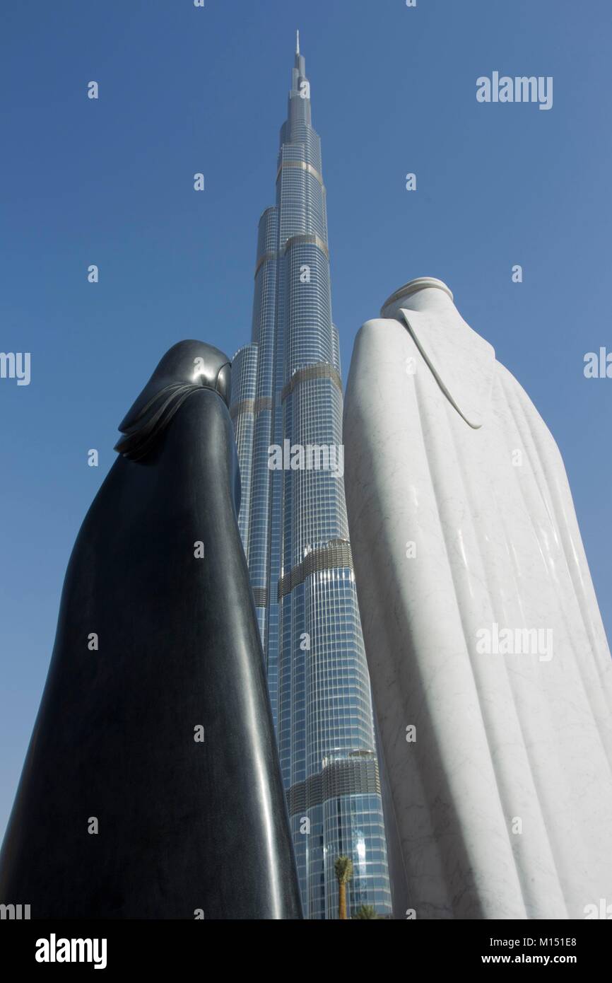 United Arab Emirates, Dubai, Together, artwork of the syrian artist Lutfi Romhein and Burj Khalifa Stock Photo