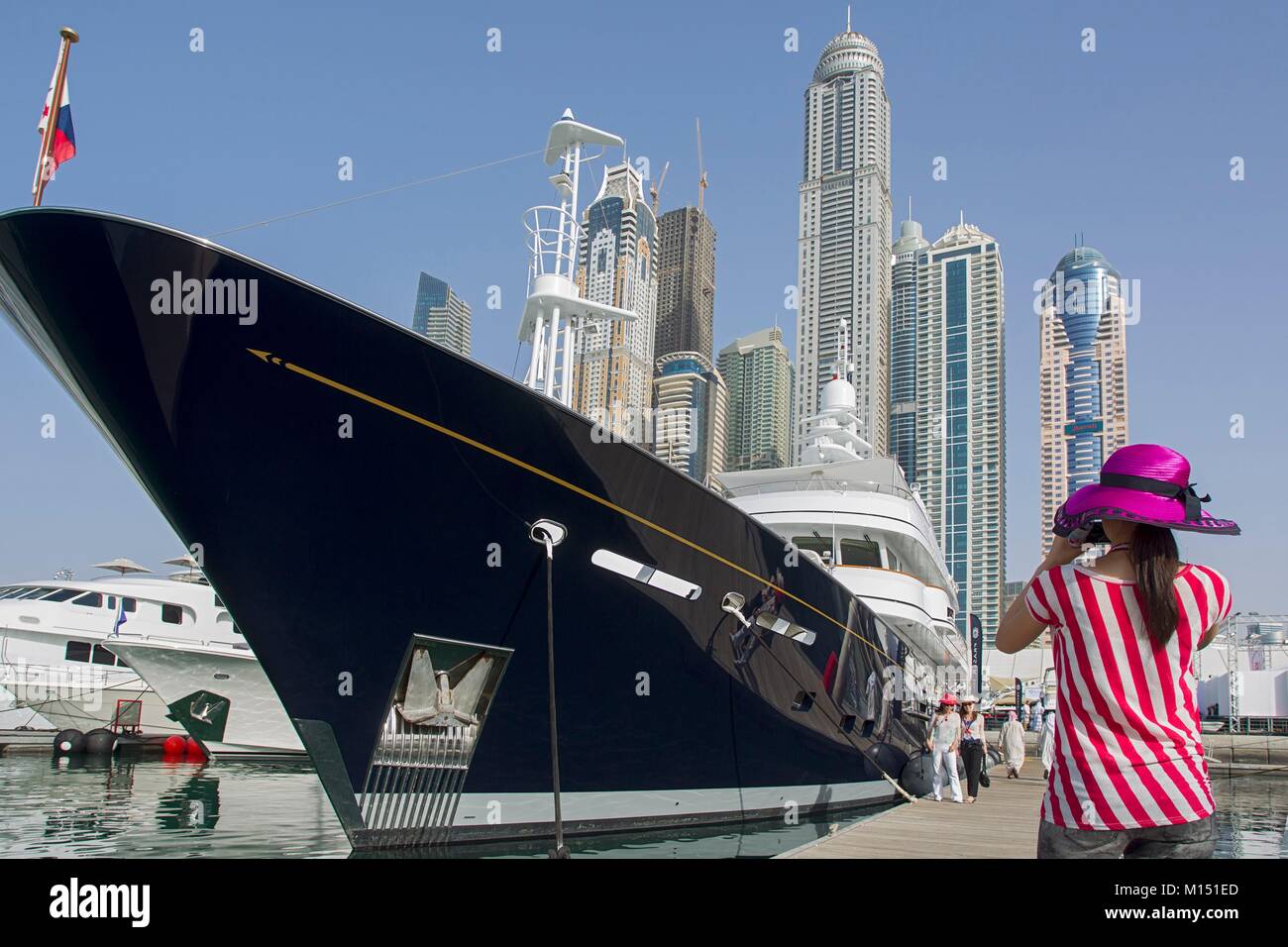 United Arab Emirates, Dubai, Al Sufouh, japanese tourists at Boat Show Stock Photo