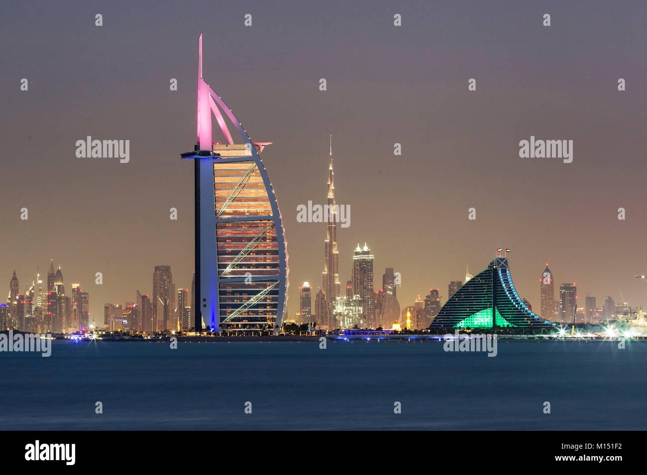 United Arab Emirates, Dubai, Burj Al Arab and Jumeirah Beach Hotel with DIFC, Business Bay and Burj Khalifa at background Stock Photo