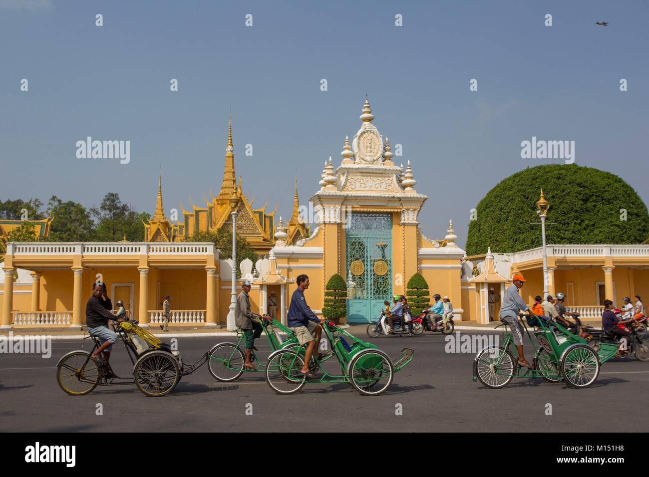 Cambodia, Phnom Penh, cyclo at Royal Palace Stock Photo