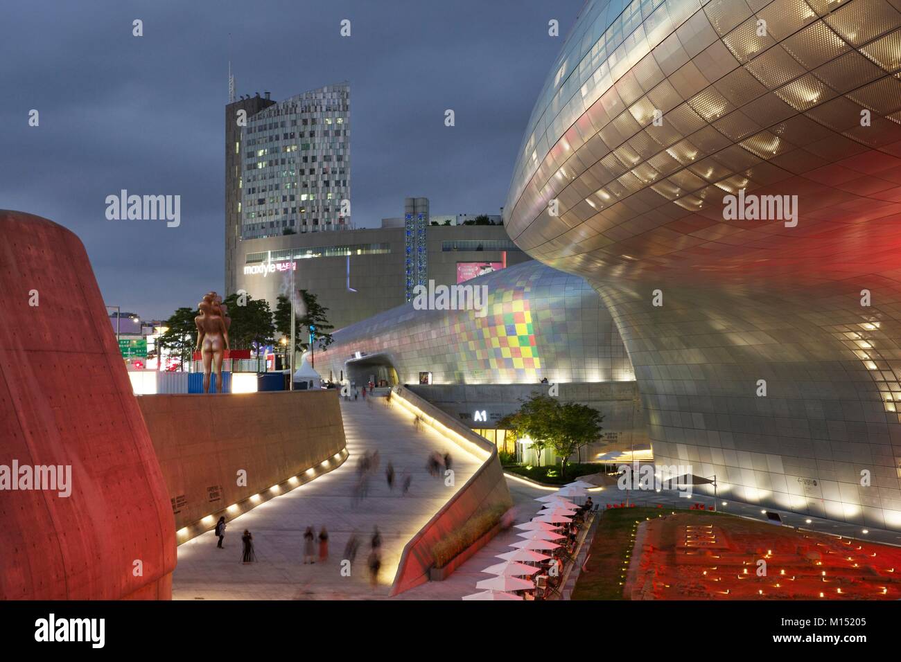 South Korea, Seoul, Dongdaemun Design Plaza, futuristic building of the architect Zaha Hadid, lit at night Stock Photo