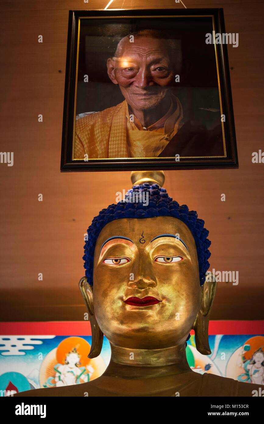 France, Savoie, Arvillard, hamlet of Saint Hugon, Karma Ling Institute, center and Buddhist monastery, statue of Buddha and portrait of founding Rimay institute Kalu Rinpoche Stock Photo