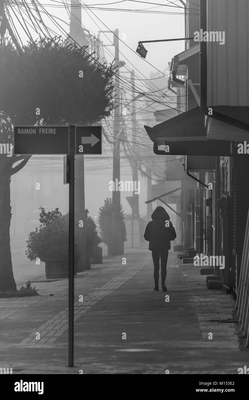 Foggy urban morning scene at chiloe island, chile Stock Photo