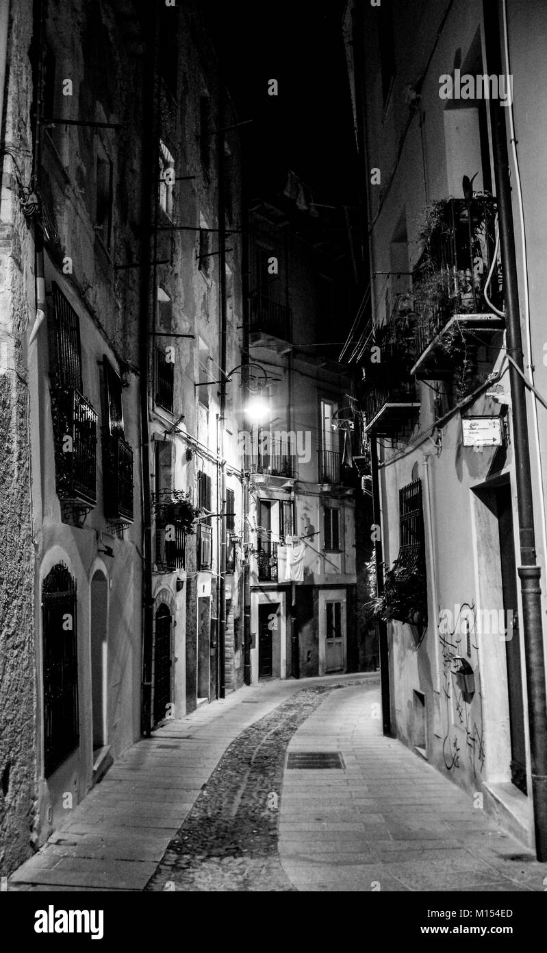 a narrow cobbled street in the ancient quarter of Castello in Cagliari, Sardinia, Italy Stock Photo