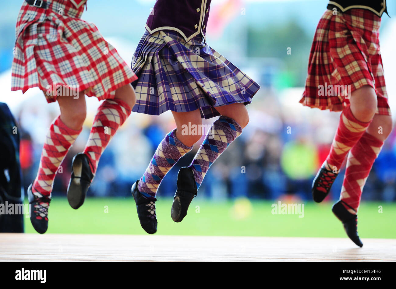 Highland dancers perform at the Ballater Highland Games, Monaltrie Park,  Ballater, Royal Deeside, Aberdeenshire. Stock Photo